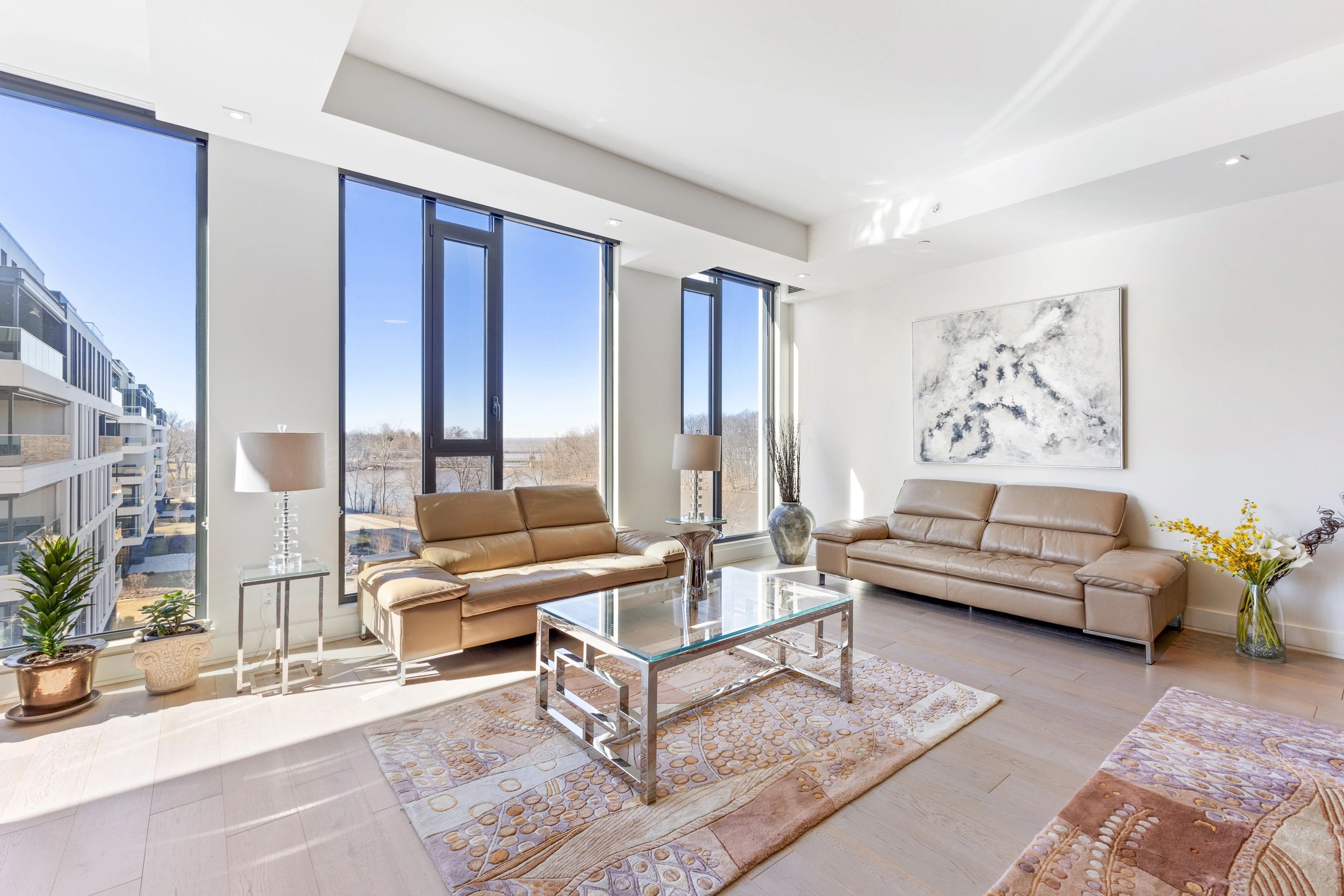 Bright living room with floor-to-ceiling windows